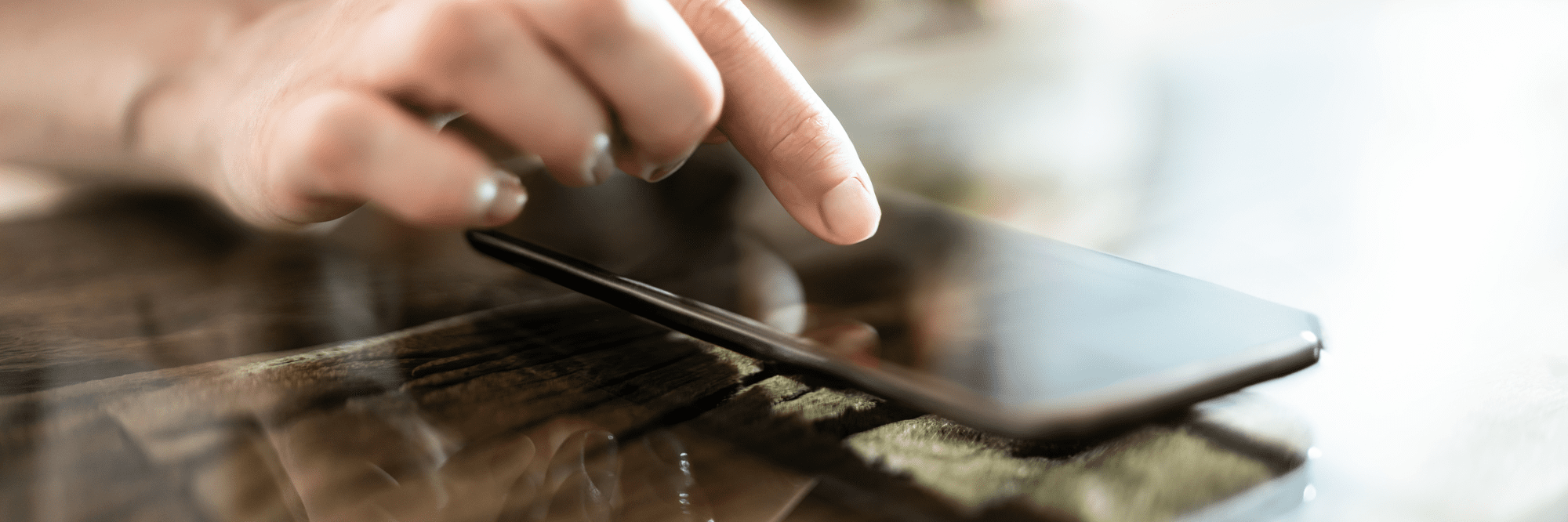 Hand Touching Phone Screen